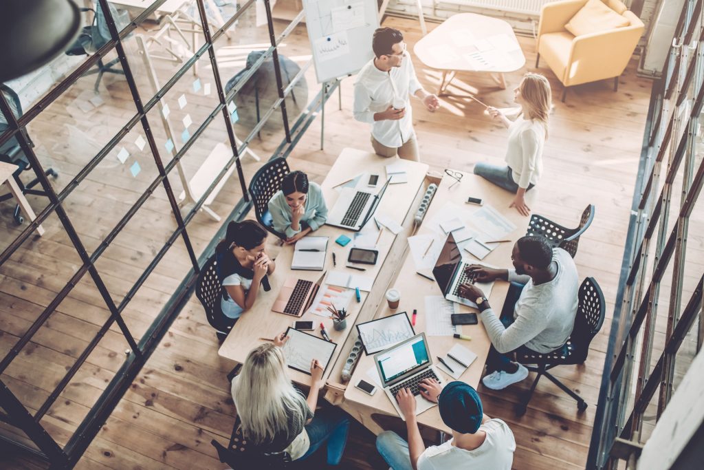 Young people working in modern office.