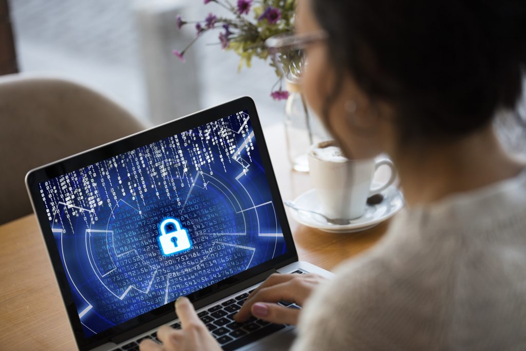 Woman in front of a secure computer